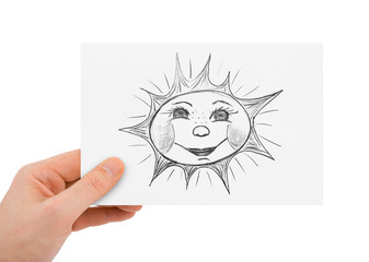 Hand with drawing sun