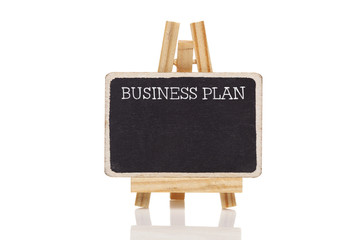 Business Plan handwritten with white chalk on a blackboard