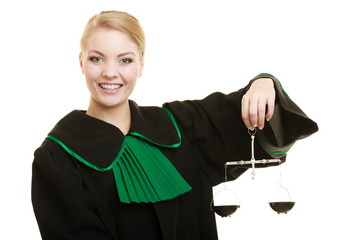 woman barrister holding scales.