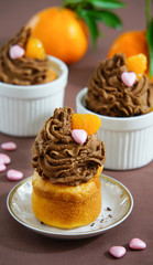 cupcakes with tangerine cream with fresh tangerine