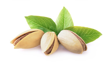 Pistachio nuts with leaves.