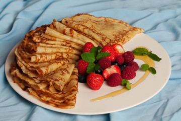 food, pancakes with mint, strawberries, raspberries, blueberries