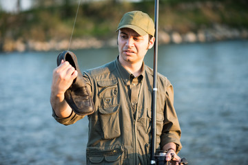 Fisherman fishing on a river