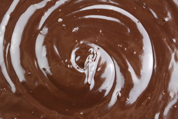 Melted semi-liquid bitter chocolate with ripples