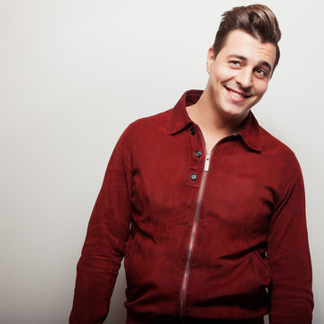 Elegant Young Handsome Man In Claret Suede Jacket.