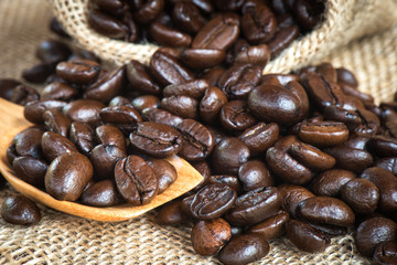 Close-up coffee bean with wooden spoon