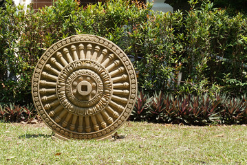 Fototapeta premium sandstone craving Dhamma Wheel