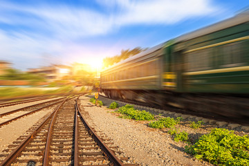 Fototapeta premium Cargo train platform at sunset with container