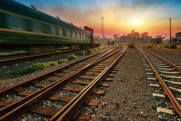 Fototapeta premium Cargo train platform at sunset with container