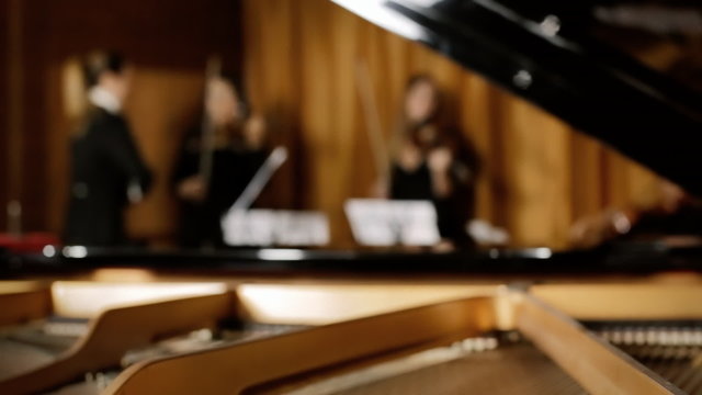 Classical music concert rehearsal defocus