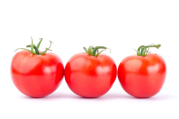 Fresh tomatoes on white background