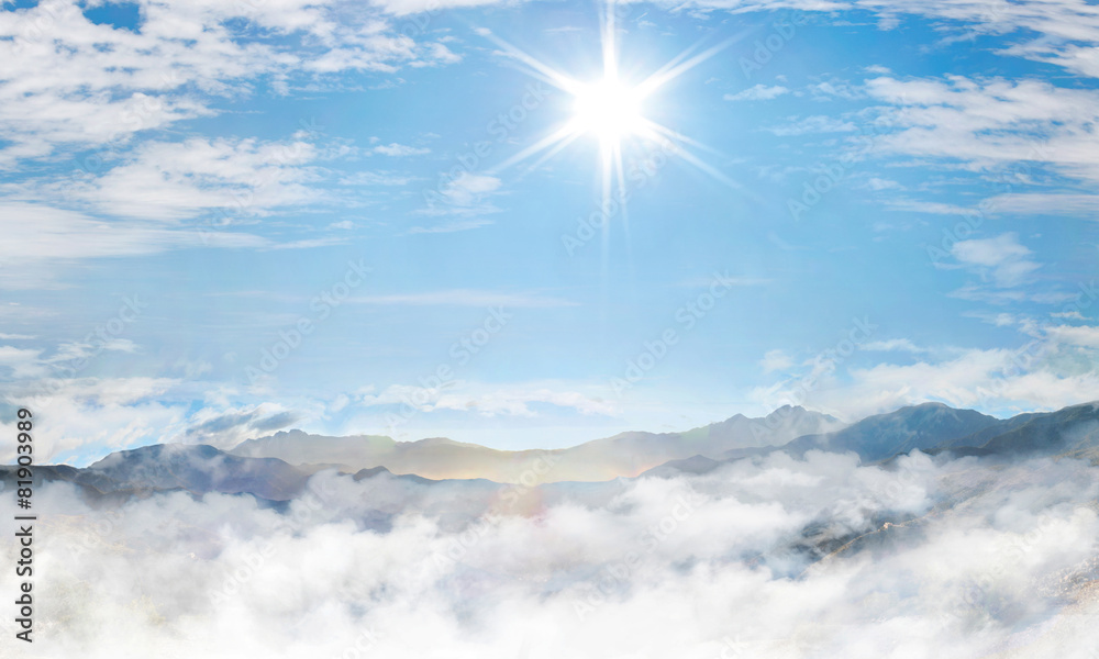 Wall mural landscape presenting mountains and cloudy sky