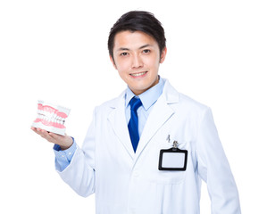 Dentist with denture