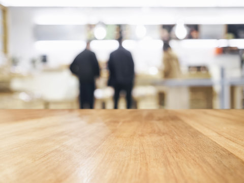 Table Top with Blurred people in shop interior background
