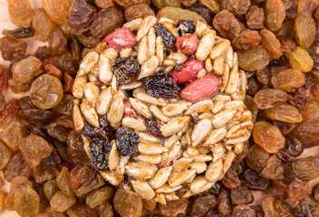 Round candied seeds and nuts with raisins.