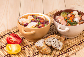 Fresh vegetable soup with sausage.