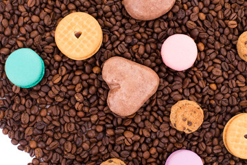 Cookies on coffee beans with macaroons.