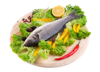Composition of fresh seabass and vegetables.