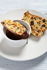 Tasty hot chocolate with cookies on a plate