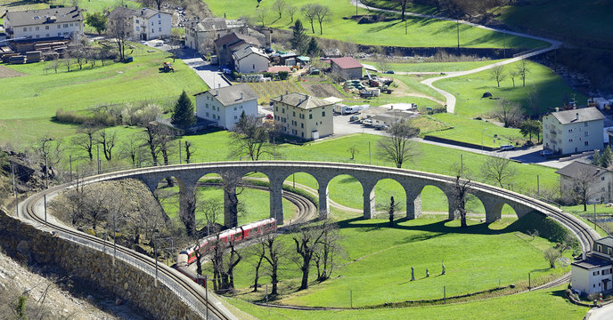 Swiss mountain train Bernina Express, circular viaduct at Brusio