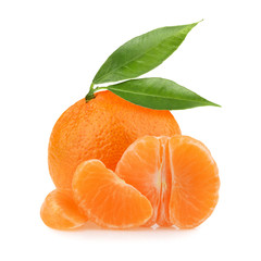 Tangerines with leaves and slices on white background