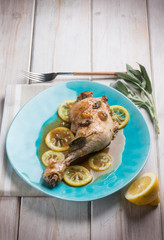 roasted chicken leg with lemon sauce