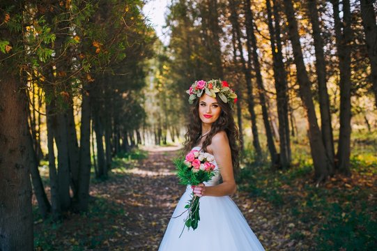 beautiful bride in the autumn park