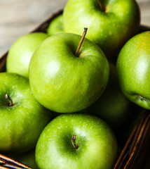 fruit. apples in a basket on wooden table