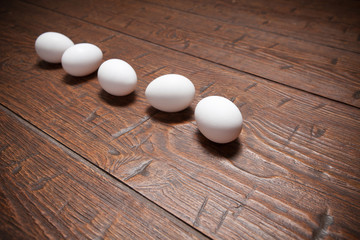 Eggs on a wooden rustic table