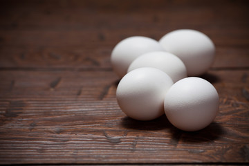 Eggs on a wooden rustic table