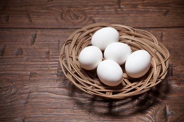 Eggs on a wooden rustic table