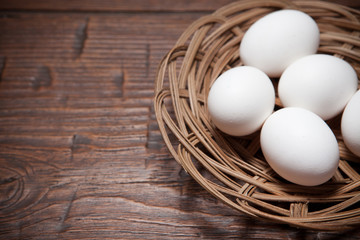 Eggs on a wooden rustic table