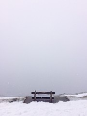 Empty bench in the Alps