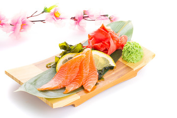 Sashimi on a wooden plate isolated on white background