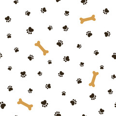 Dog theme seamless pattern with paw footprints and bones © Kate Garyuk