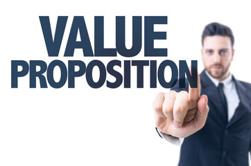 Business man pointing the text: Value Proposition