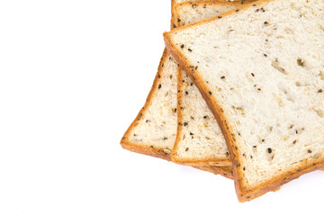 selective focus closeup cereal and black sesame bread on white b