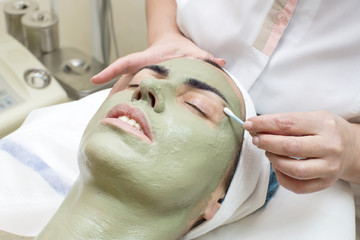 Obraz na płótnie Canvas massage and facial peels at the salon cosmetics