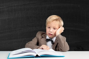 School. Student in the class receives education