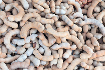 Sweet tamarind on wood plank.