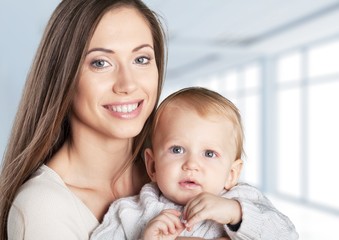 Adorable. A happy family. young mother with baby
