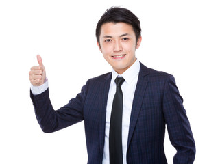 Businessman with thumb up gesture