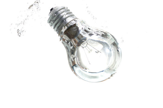 Light Bulb drop into Water  on White background