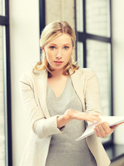 worried woman with documents