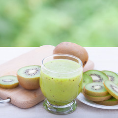 Fresh juice and fruits on white background.