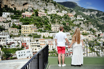 Fototapeta na wymiar couple holding hands in Positano, Italy
