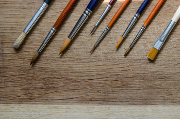 Various art brushess on wodden board