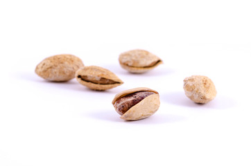 Toasted pistachios on a white background