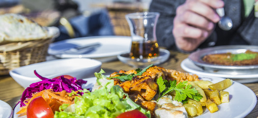 lamb with vegetables and dessert tea in a Turkish restaurant