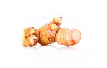Galangal ginger piece isolated on a white background